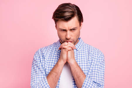 Close up photo of attractive brunet serious facial expression he him his man arms fingers  together...