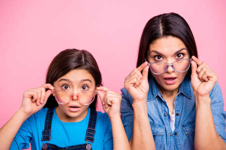Close-up portrait of two nice cute pretty lovely attractive funny confused straight-haired girls...