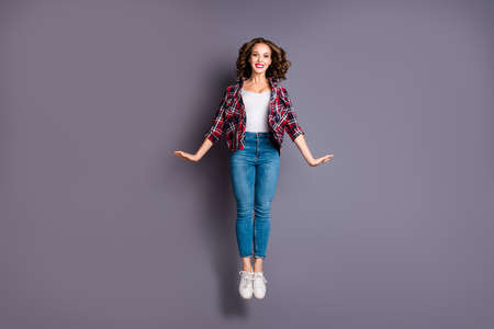 Full length size body view photo jumping high amazing attractive beautiful she her lady flight up in...