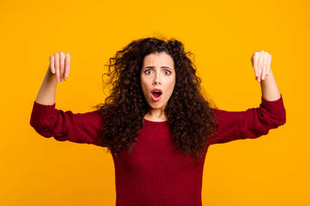 Close up photo amazing her she lady arms palms copyspace paper card presenting novelty very expensive oh no wearing red knitted sweater pullover clothes outfit isolated yellow background.の写真素材