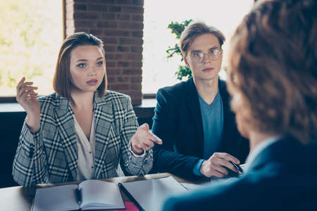 Nice chic elegant stylish attractive serious busy business sharks experts specialists negotiation financial growth economy sales plan at modern industrial loft interior work place stationの写真素材