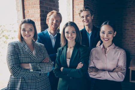 Portrait of nice clever smart intelligent lovely glamorous beautiful diverse attractive handsome cheery executive top management day folded arms at modern industrial loft interior work place stationの写真素材