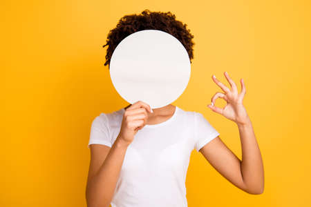 Close up photo beautiful amazing she her dark skin lady hiding face okey symbol fingers round circle...