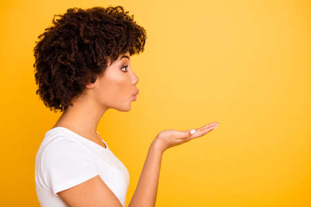 Close up side profile photo beautiful amazing she her dark skin lady sending kisses like best...