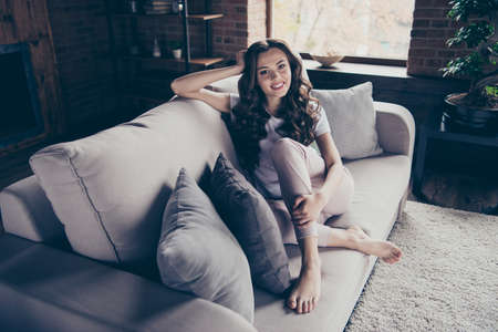 Close up portrait amazing beautiful brunette she her lady legs couch leaning pillows wait  family...
