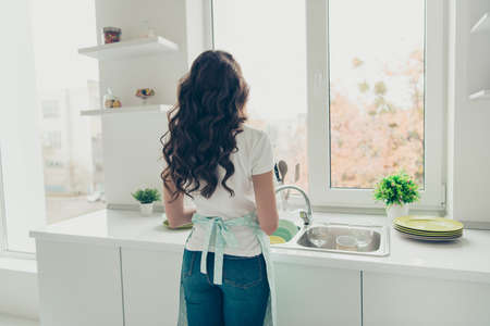 Rear back behind view portrait of her she nice charming attractive beautiful wavy-haired house-wife...