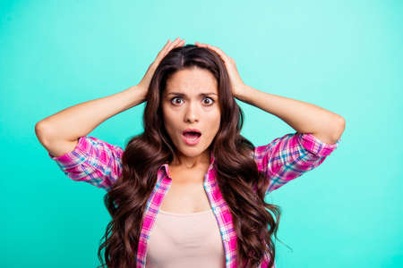 Close-up portrait of her she nice attractive lovely confused wavy-haired lady wearing checked shirt...