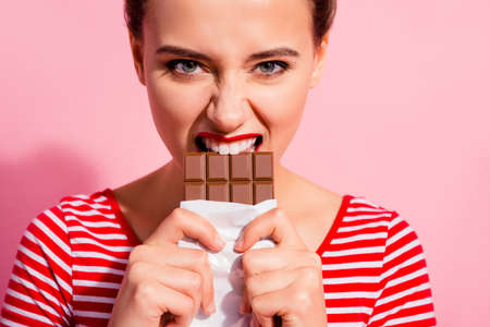 Cropped close-up portrait of her she nice cute charming attractive lovely hungry girl in striped...