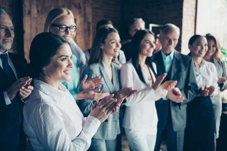 Close up side profile blurry view photo different age members business people stand she her he him...