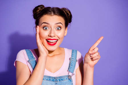 Close up photo beautiful amazing she her lady buns wow face hand arm index finger raised empty space...