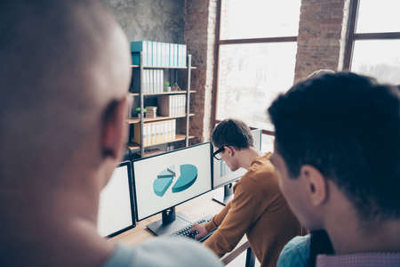 Busy smart clever intelligent experts marketers wearing casual analyzing making data information research company growth progress at industrial loft interior workplace workstation.の写真素材