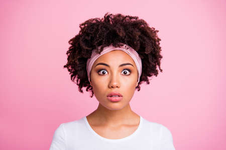 Close up photo beautiful amazing she her dark skin staring worried unbelievable unexpected epic fail oh no facial expression wear head scarf casual white t-shirt isolated pink bright backgroundの写真素材