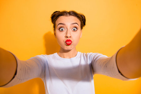 Like child. Portrait of cute funny joking funky lovely girlish lady fooling around making photos...