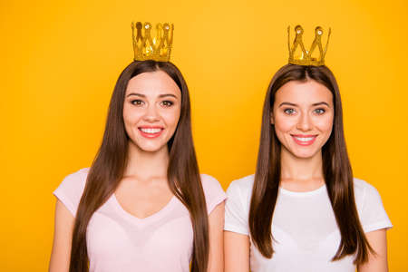 Close-up portrait of nice cute charming lovely well-groomed sweet fascinating feminine attractive confident cheerful straight-haired girls isolated over bright vivid shine background.の写真素材