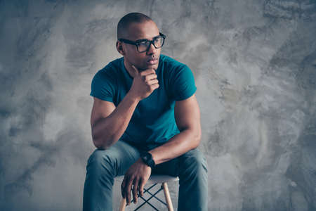 Close up photo amazing beautiful he him his dark skin macho sit comfy cozy chair hold arms hands...