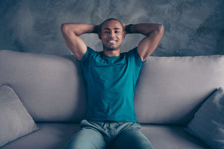 Close up photo amazing funky beautiful he him his dark skin macho handsome hold hands behind head...