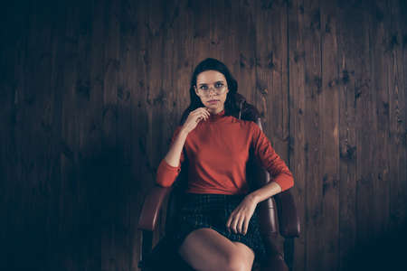 Portrait clever magnificent attractive entrepreneur sit leather furniture touch chin hand finger...