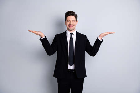 Portrait of handsome stylish sales agent discount present demonstrate advert options choice decision...