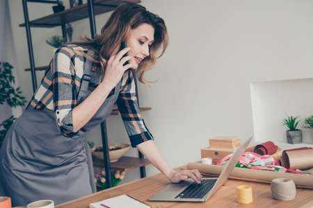 Portrait positive stylish trendy lady vendor busy content cheerful use device wireless connection...