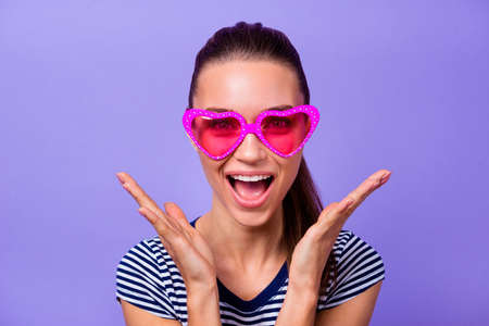 Close up photo of cute funny funky teen teenager astonished impressed incredible information discount novelty wonder scream dressed fashionable classy outfit isolated colorful violet backgroundの写真素材