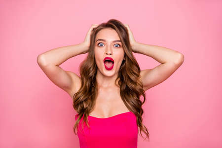 Close up photo amazing beautiful she her lady yell scream shout hands arms hold head unexpected success prom queen announce wear cute colorful formal-wear dress isolated pink bright vivid backgroundの写真素材