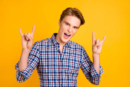 Close-up portrait of his he nice-looking attractive cool cheerful cheery guy wearing checked shirt...