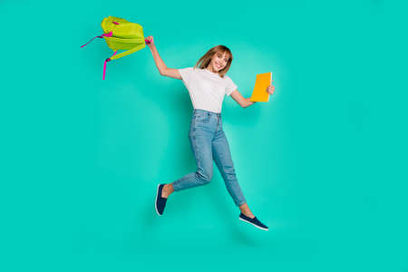 Full length side profile body size photo beautiful she her lady weekend jump high arms hands hold...
