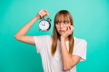 Close up photo amazing beautiful she her lady hold raise arm hand metal alarm clock missed work bad...