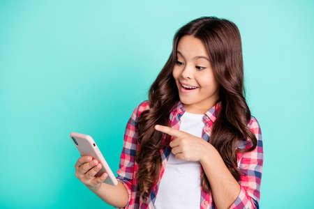 Close-up portrait of her she nice cute attractive cheerful amazed wavy-haired girl in checked shirt...