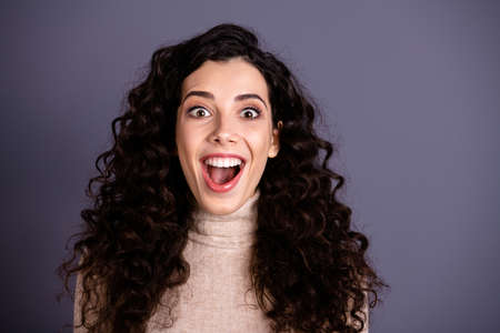 Close up photo beautiful she her lady ecstatic yelling glad not believe eyes sale discount black friday shopping open mouth yes yeah wear casual pastel beige pullover isolated grey backgroundの写真素材