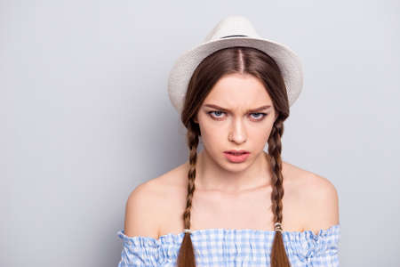 Close up photo of disappointed lady youth teen teenager have plaid fashionable shirt bad mood scandal displeased frown isolated grey argent backgroundの写真素材