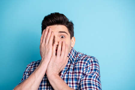 Close up photo disappointed confused millennial person hide eye cant see horror serial worried...