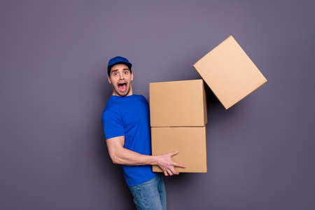 Close up photo profession yelling he him his deliveryboy hold hands large big heavy, parcel boxes...