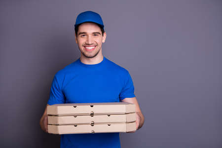 Close up photo express rapid speed specialist he him his delivery boy hold strong arms three, parcel...