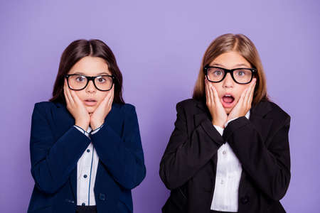 Close up photo of beautiful children impressed hear horrible news, wear trendy stylish eyewear...