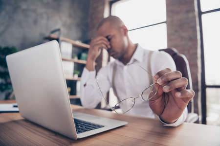 Portrait of his he nice stylish sad guy freelancer company organization founder sorrow fail failure health care medicine overworked at industrial loft interior work place station indoorsの写真素材