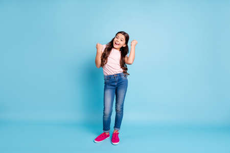 Full length body size view photo content cute kid lucky scream yeah goals fan free time weekend...