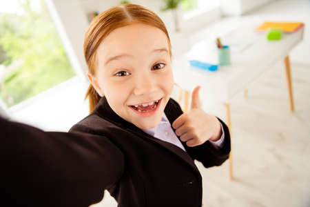 Close up photo of lovely cute charming sweet adorable kid excited cheerful show alright agree great...