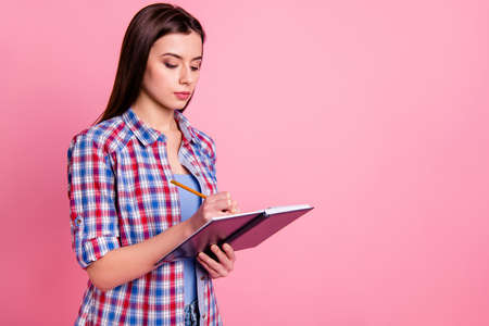 Porrait of concentrated dream dreamy person people hold hand make story, plan decide choose solve have prepare project report true journalist dressed plaid outfit isolated pastel backgroundの写真素材