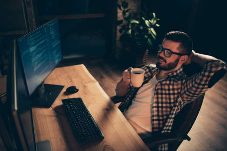 Close up photo handsome enjoy mug hot beverage he him his guy relaxing big chair coder php css...