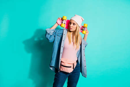 Portrait of nice-looking charming cute attractive lovely fashionable content cool girl carrying long...