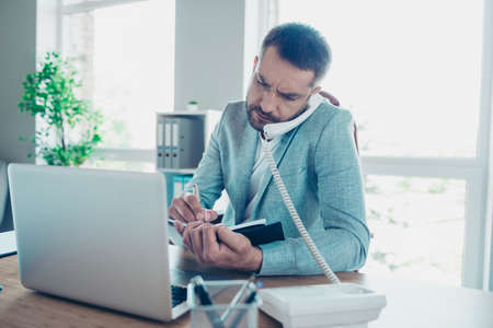 Close up photo handsome he him his guy hold paper pen pencil make notes organizer listen important...