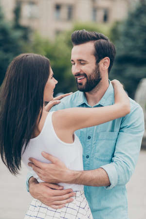 Portrait of charming nice pretty attractive funny cute lovely people millennial bearded blue shirt...