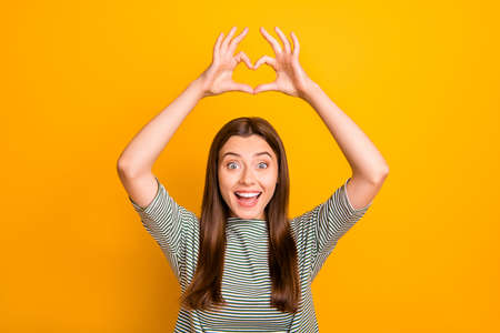 Photo of attractive wonderful woman gifting her love to you free of charge while isolated with...