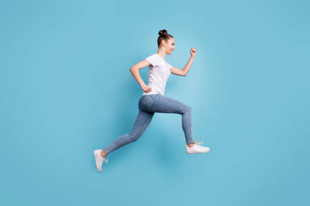 Profile photo of excited lady hurrying shopping wear white casual t-shirt jeans denim isolated blue...