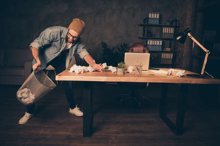 Photo of casual mad manager of some company wearing jeans denim shirt with brown hat failing to make...