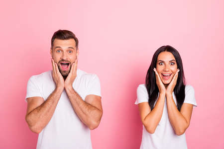 Portrait of his he her she two nice-looking attractive lovely charming cute cheerful cheery delighted person great good news isolated over pink pastel backgroundの写真素材