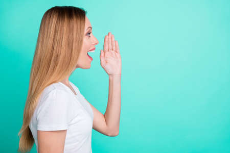 Profile side photo of cute person shouting wondering advertising wearing white t-shirt isolated over...