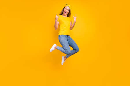 Full body photo of beautiful lady jumping high rejoicing at metal concert wear casual clothes...