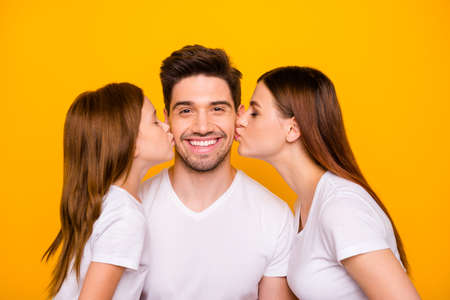 Photo of dad mom and small foxy lady kissing daddy happy together wear casual outfit isolated yellow...